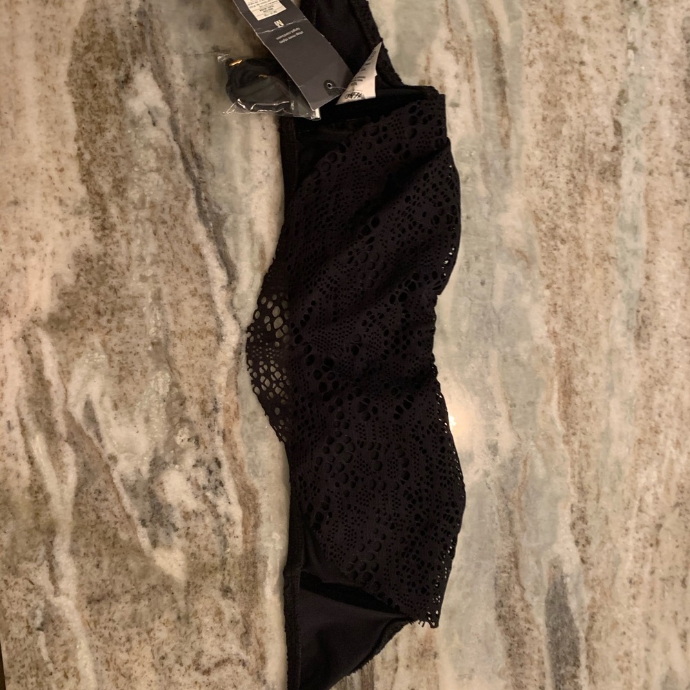 With tags bathing suit